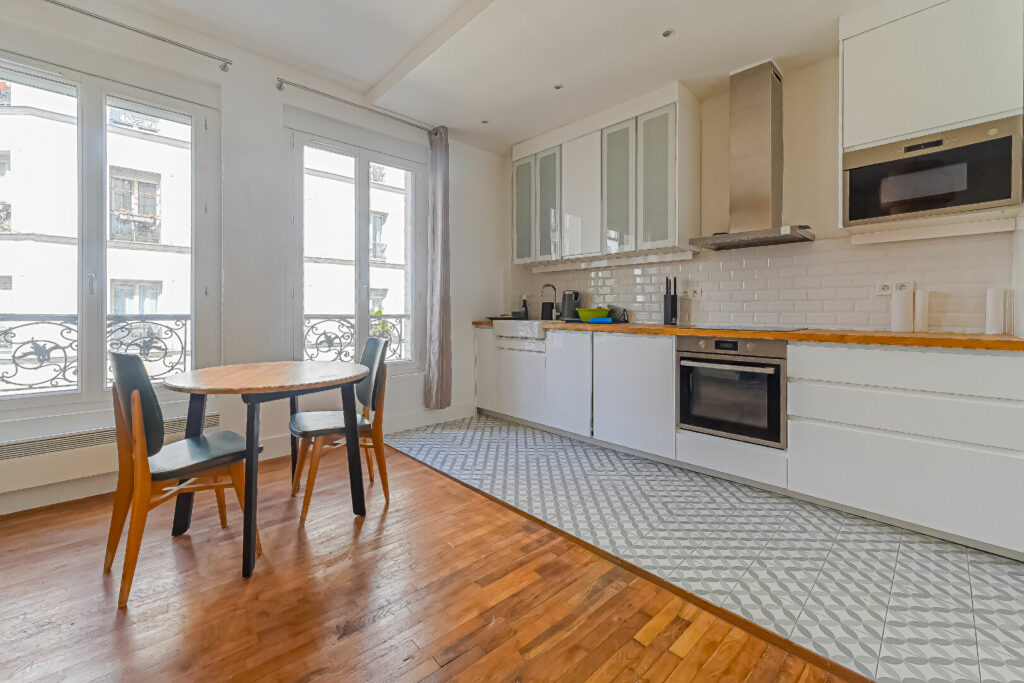 Appartement Paris 3 pièce(s) 51 m2 - Paris 18e - Léon Immobilier