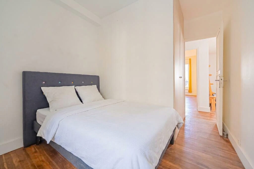 Appartement Paris 3 pièce(s) 51 m2 - Paris 18e - Léon Immobilier